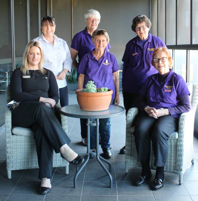 COMFORTABLE SPOT: Viewing some of the new tables and chairs at SERH are the Commonwealth Bank's Rachael Holt, the hospital's Marg Glass with the auxiliary's Kay Dowton, Lyn Murphy, Anne Sheedy and Gillian Wileman.  