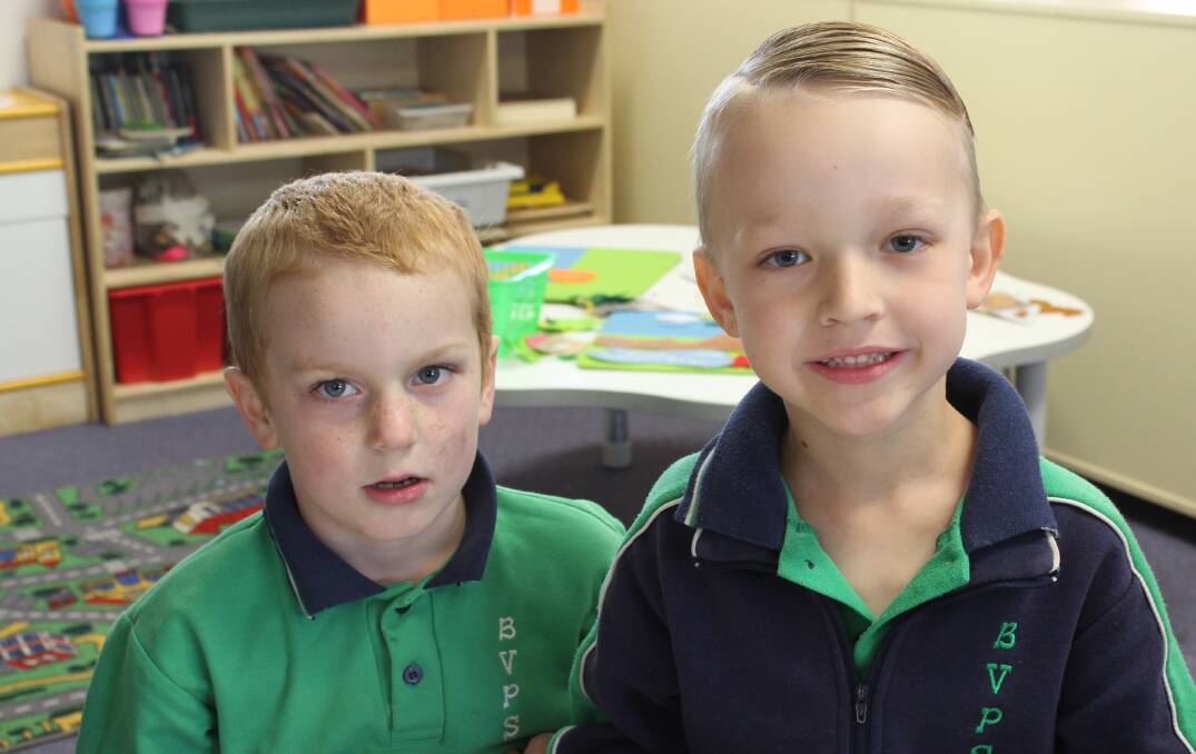 Bega Valley Public's Kindergarten pupils Coby and Darcy give big smiles for the camera. 