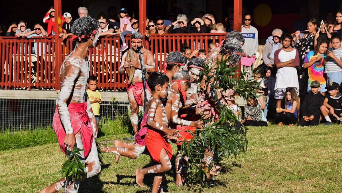 A welcome dance is performed at the Wallaga Lake Koori Village on Sunday. Picture: Sean Burke