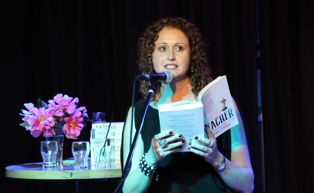 STRUGGLES OF TEACHING: Author Gabbie Stroud reads from her book Teacher at the Tathra Hotel during her book launch in July.