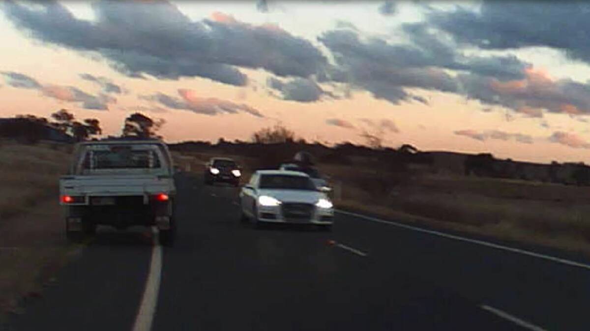 CLOSE CALL: A screenshot of dashcam footage taken by Grace Stevens where a ute had to pull off onto the side of the road in order to avoid a collision with a white car driving in the opposite direction. 