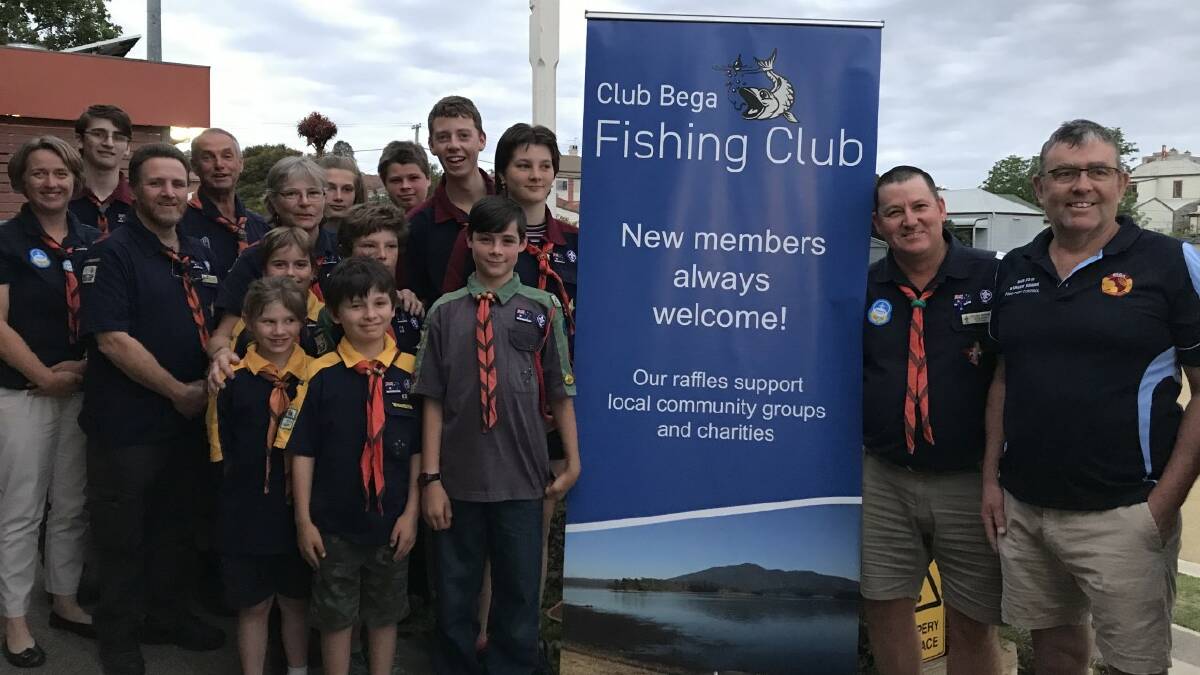 Members of the 1st Cobargo Scout Group at Club Bega to receive $1000 donation from Barry Blacka (far right) of the Club Bega Fishing Club.