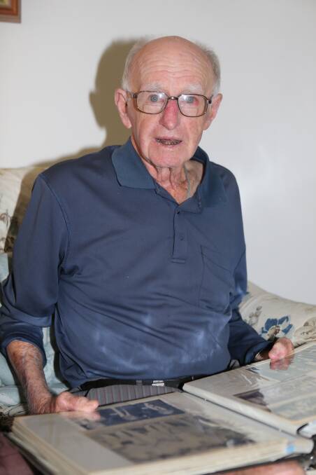 One of the oldest surviving Pyree Rovers players the late Greg Watts books through his scrapbook.
