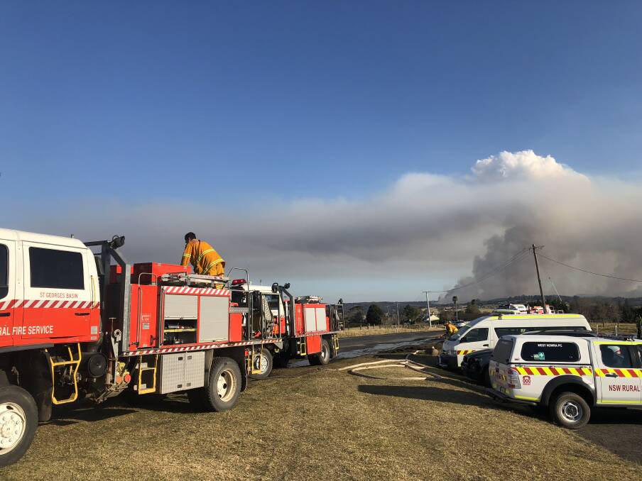 Emergency services at the command post at the Milton RFS shed. Photo: John Hanscombe