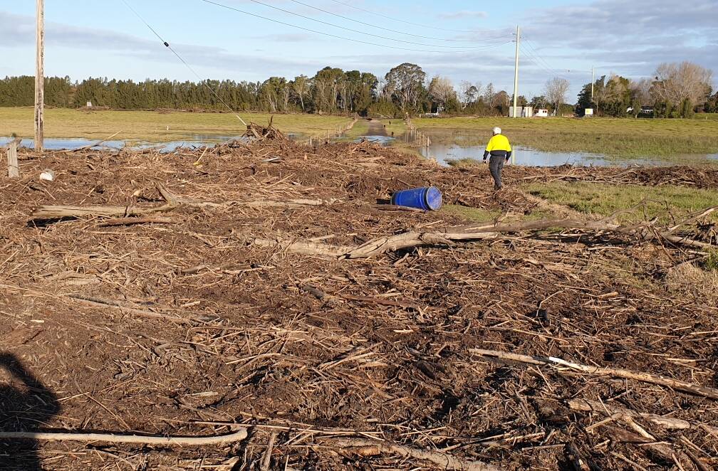 A massive clean up awaits on Pig Island after the flood debris.
