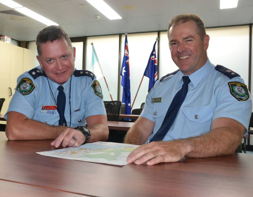 NEW FORCE: Officer in charge of Nowra Police Station Inspector Ray Stynes and South Coast Police District Commander, Superintendent Steve Hegarty look over the region’s new borders.
