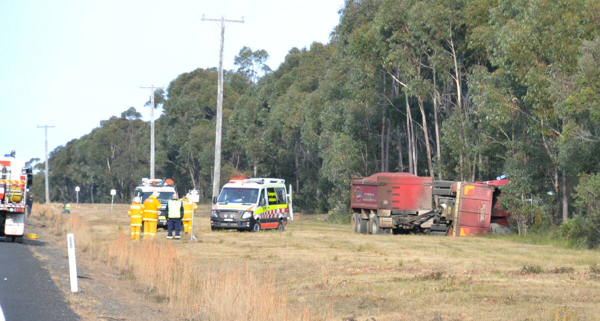 CRASH SITE: Emergency services at the scene of a crash on Braidwood Road Monday morning.