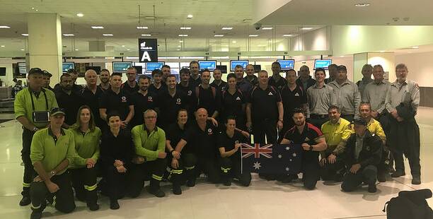 Local NSW National Parks and Wildlife Service area manager Alex Deura  (third from right back row) with personnel who flew to Canada to help with the escalating wildfire emergency in British Columbia.