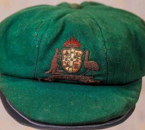 NATIONAL TREASURE: Sir Donald Bradman's very first baggy green is currently being auctioned online through Pickles.com.au. Image Pickles