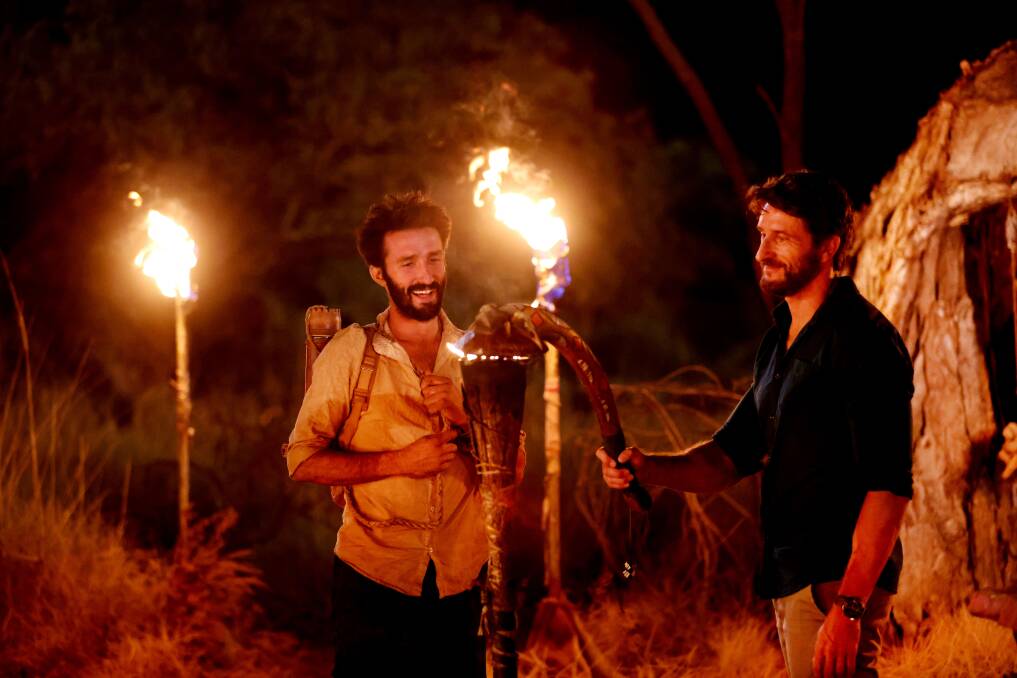 Dapto wild man Andrew Ucles (left) l with host Jonathan LaPaglia at the Tribal Council on the Survivor reality TV show. Picture: Supplied
