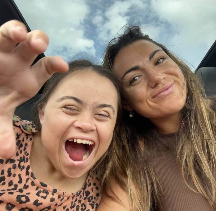 Millie Elliott's advocacy for people with disabilities is driven by seeing little sister Hannah grow up and transition to adulthood with down syndrome. Picture Instagram 