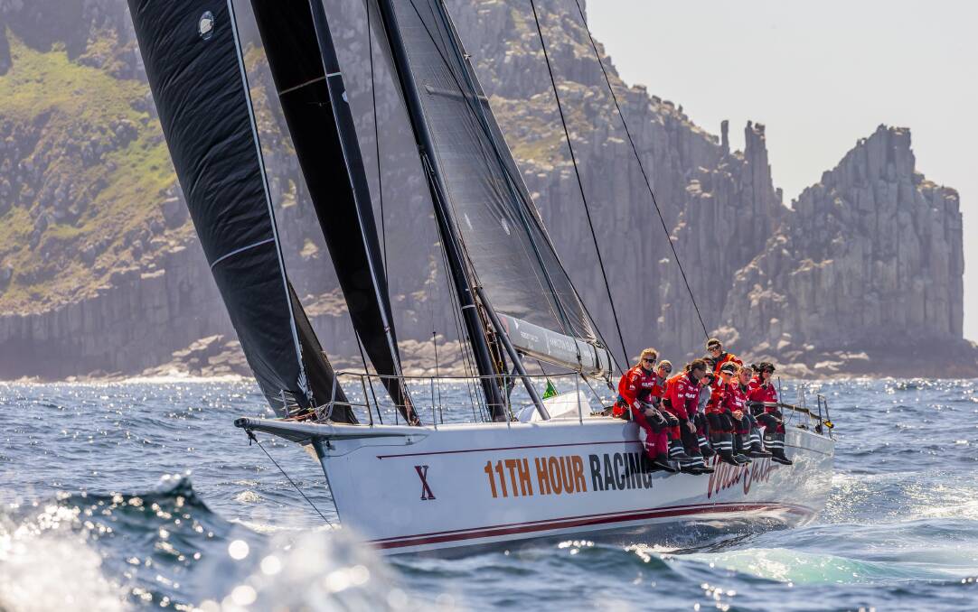 On again: The Wild Oats XI crew provide ballast on the last leg towards Hobart in their line honours result at last year's Sydney to Hobart. Picture: Sydney to Hobart media. 