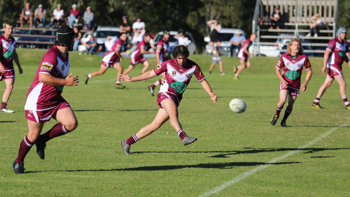 Callum Bower-Scott kicks a grubber to the Batemans Bay try-line during the first half of Tathra's 46-32 win on Sunday. 
