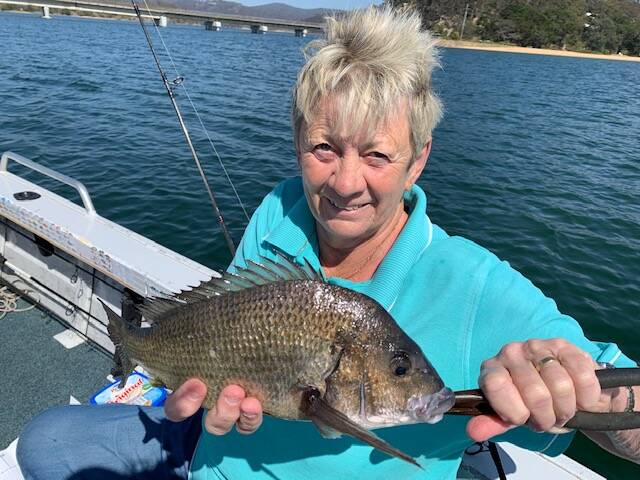 Back you go: Helen Pearsall of Tura Beach shows a lovely catch-and-release bream at Mogareeka where there are reports of lovely bream at the bridge and upstream beside the rock wall.