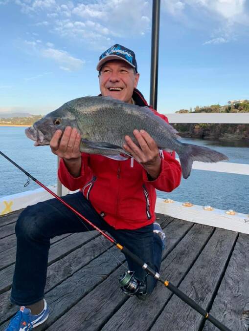 Melbourne visitor Frank Daquino shows off a huge 65cm Morwong taken from the Merimbula Fishing Platform.