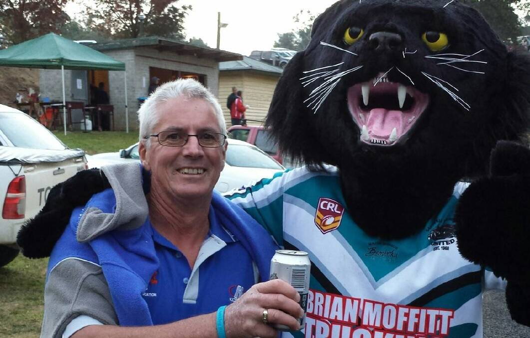 A Panther by any other name: Michael Haigh, pictured with the CBU Panther, says the stars are aligning for Penrith in the NRL grand final. 