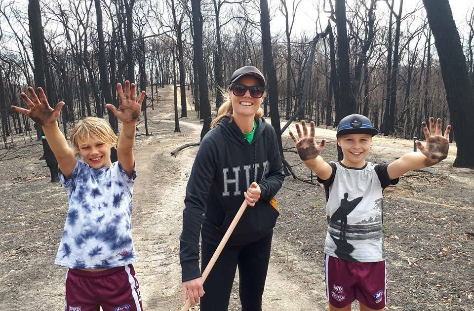 Trails cleaned: Some of the volunteers during the 'Rake and Ride' clean-up were quite literally getting their hands dirty over the weekend. 