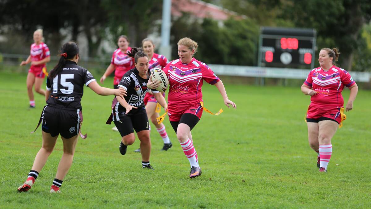A Pink Panther makes a break against the Cooma Fillies during the Nines tournament on Saturday. 