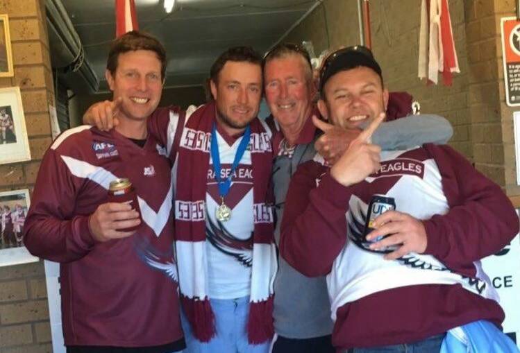 Celebrations: Brad McBain, Luke Taylor, Rob Little and John 'Moona' Harvey catch up after a thrilling finals win. 