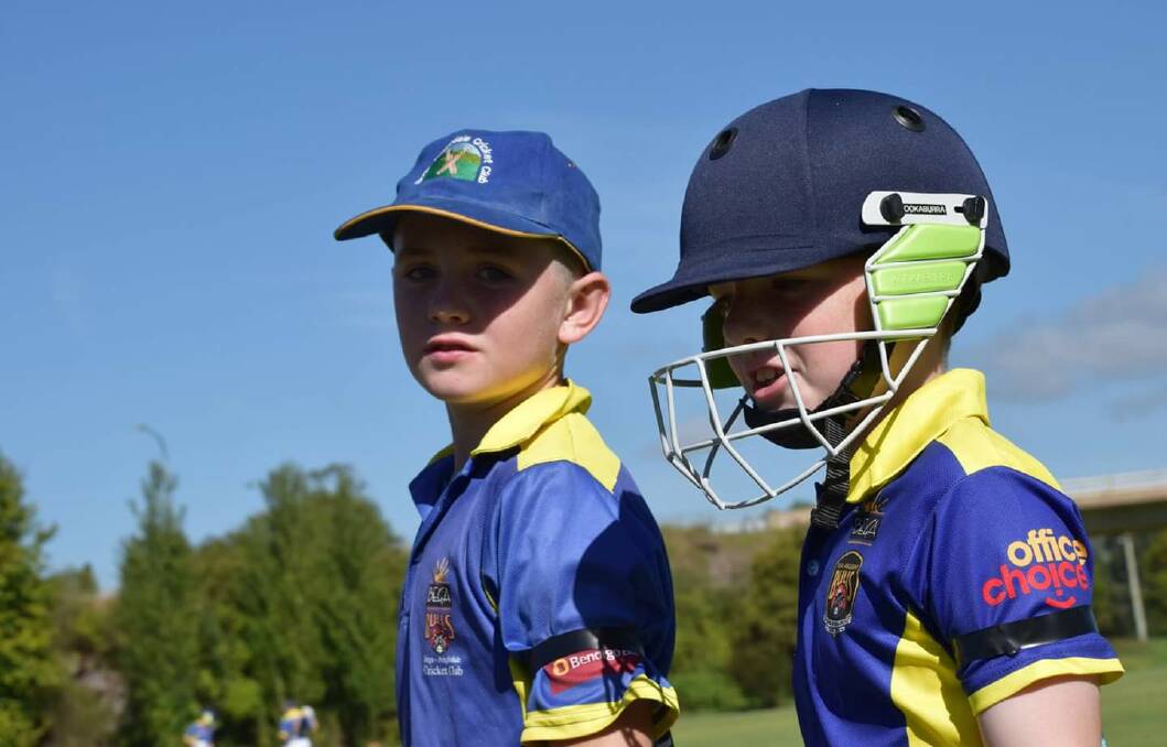 The stern-faced Sam Griffin and Rory Deighton get ready for their turn at the crease during the semi-final and providing a good result for the team. 