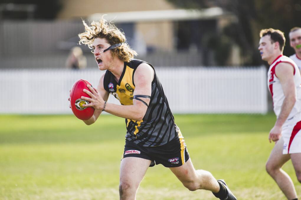Got pace?: Kel Evans in action during last year's final for the Queanbeyan Tigers, is already breaking records for the Canberra Demons. Picture: Jamila Toderas