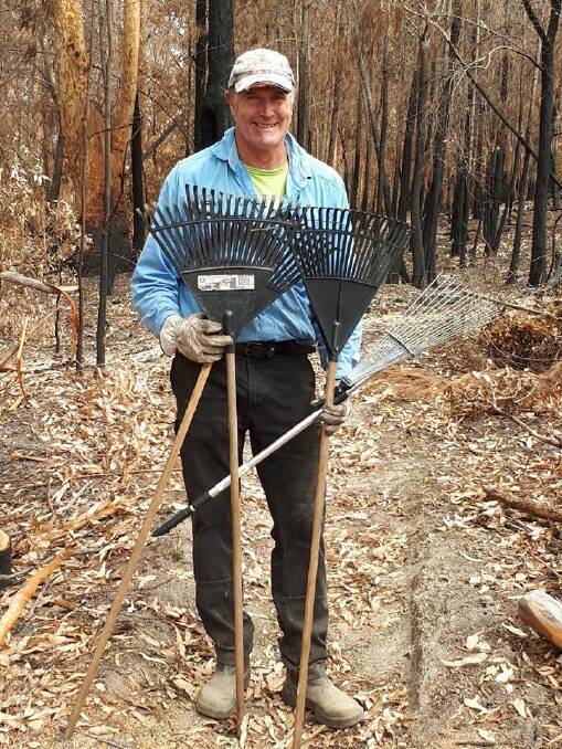 Tathra MTB Club's Andy Johnson is already on course clearing burnt out logs, but a 'rake and ride' will get the Bundadung circuit back to race readiness. 