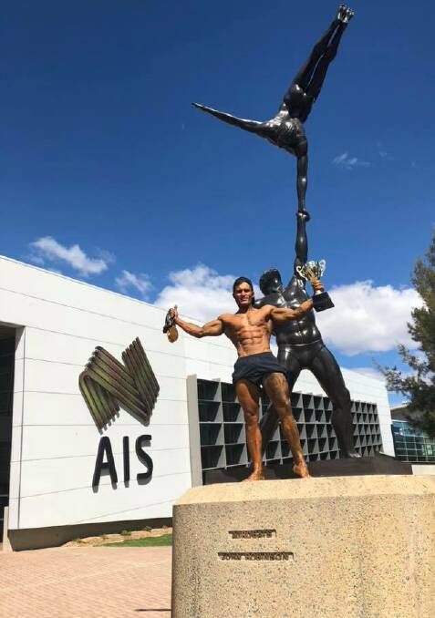 Title winner: Nathan Sturgiss poses with his Mr ACT and individual medals outside the AIS during the ANB Canberra Muscle and Model spectacular. Picture: Facebook. 