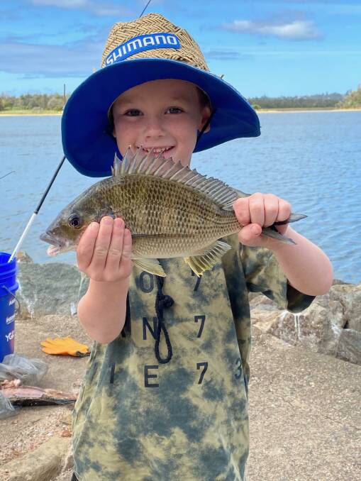 Nice catch!: Five-year-old Lachlan Wilkins with his first ever bream, taken from the shore near the bridge at Mogareeka. 