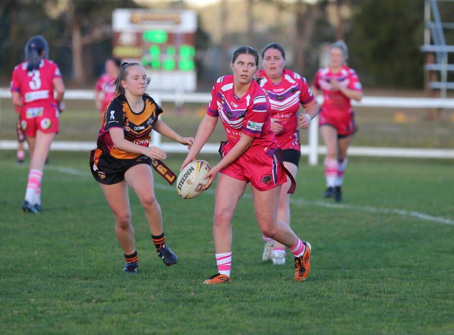 Jemma Harvey sends the ball down the line during the Pink Panthers loss to the Bay Tigers 14-6 on Saturday. 