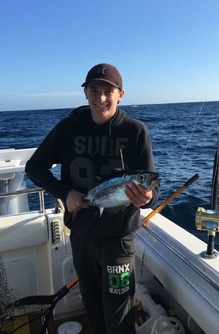 Junior member Joshua Jones on Lucky 1, Captained by Martin Bartlett, shows his first tag and release Albacore Tuna off Eden. 