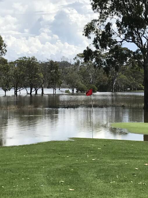 Water-logged: The third green shows the extent of flooding at Tathra earlier in the week before the Bega River was opened. Picture: supplied. 