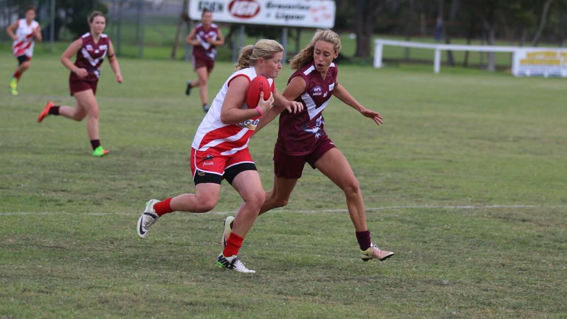 Tathra's Tarni Evans (right) has been named in the AFLW Academy. 