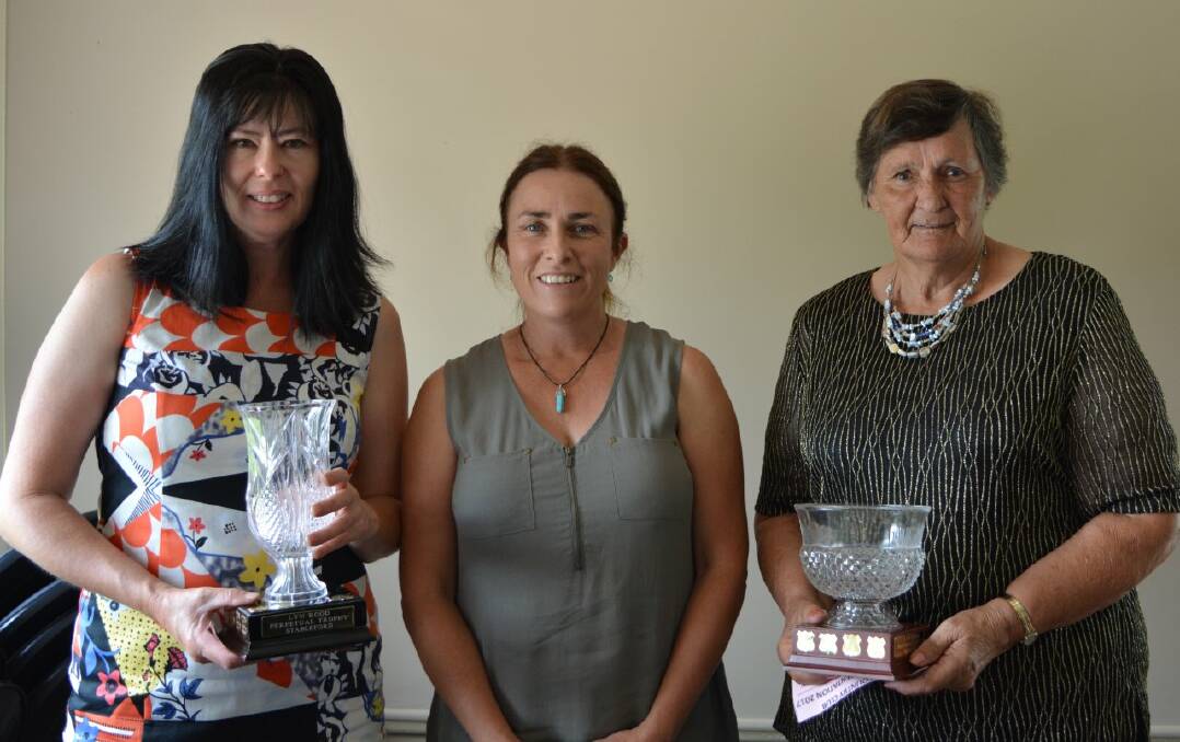 Debbie Roberts (centre) congratulates the winners of the annual Lyn Rood award - Kerry Carter and Margaret Atkins. 
