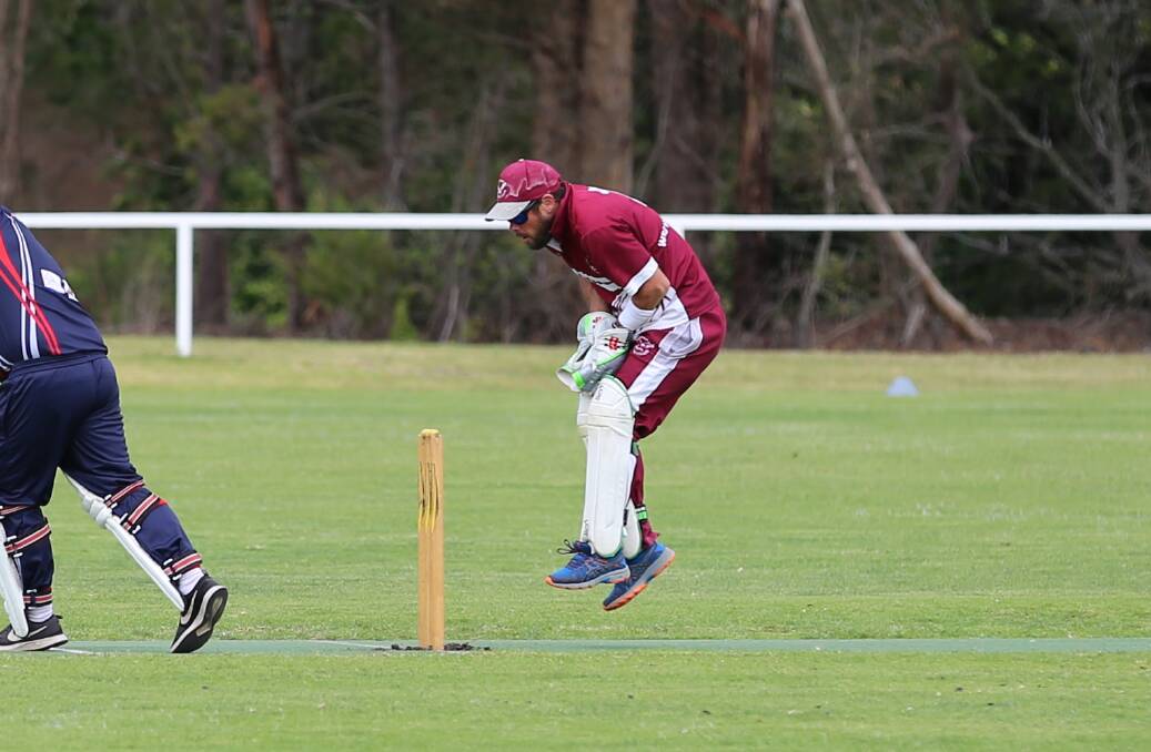 Geordie Gibbs gets airborne at wicket keeper as the Tathra Sea Eagles clean up the Merimbula middle order. 