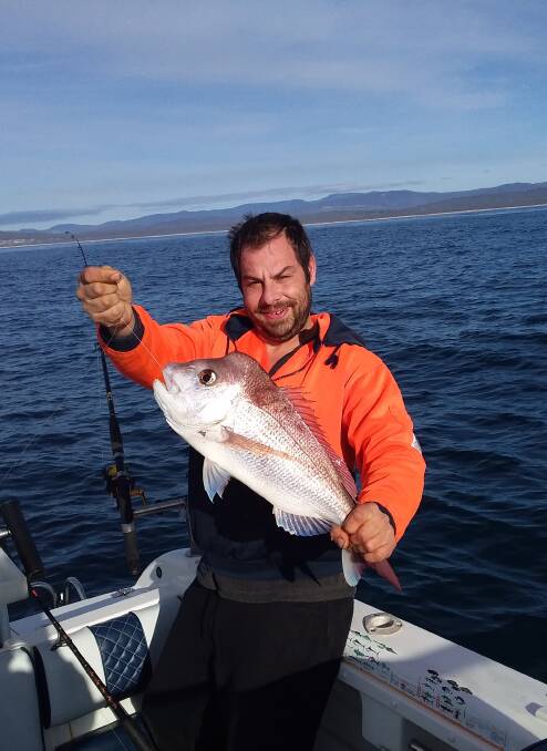 Nice catch: Merimbula's Brendan Galea shows off a magnificent snapper he landed off Long Point, Merimbula. Picture: Supplied. 
