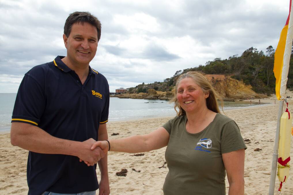 Jane Funston congratulates Brendan Buckley of Betta Electrical on being drawn as the name sponsor for the 2020 Wharf to Waves. 