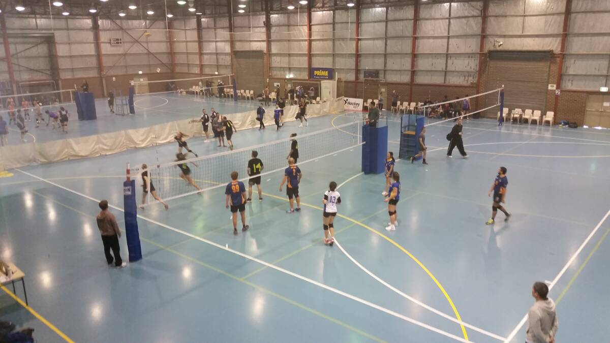 Players hussle around the court during a good rally at the Bega Volleyball competition last season. 