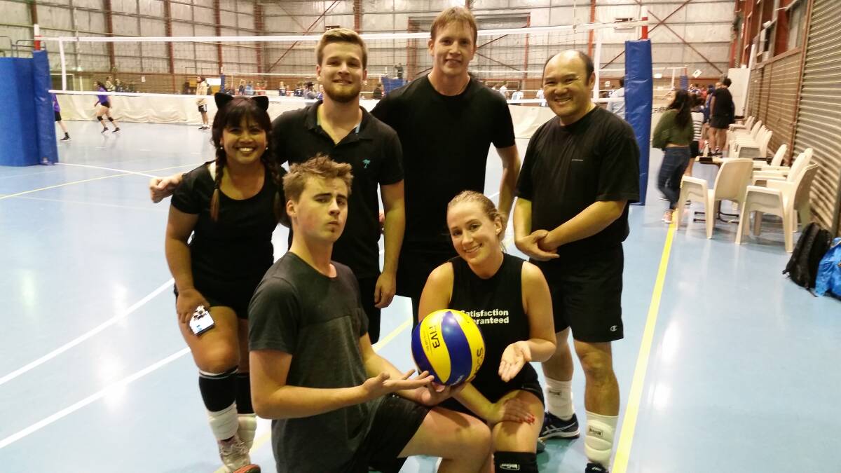 Out for fun: Bega volleyball players with their Canberra pickups, who finished fifth in division two mixed play during the Canberra Cup. 