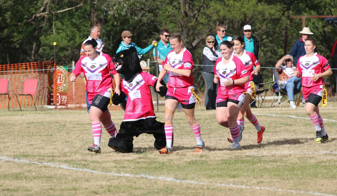 Celebrations: Candelo-Bemboka mascot Royce the Panther runs out with the ladies league-tag outfit during Saturday's 50th anniversary celebration round. 