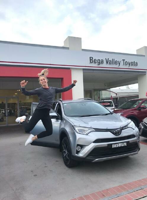Oh what a feeling: Kezie Apps is stoked to take delivery of a new Rav 4, the first in a special Kezie Apps Signature Series at Bega Valley Motors. Picture: Michael Sturgess. 