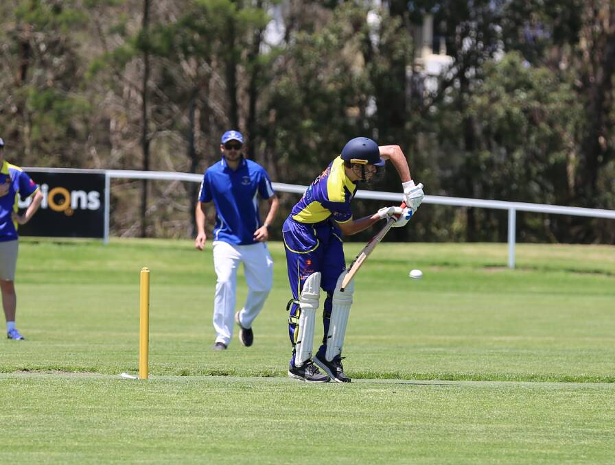 Steady at crease: Lachlan Sims blocks a shot from the Bluedogs recently with Sims one of the leading bats in Bega's win over Bermagui. 