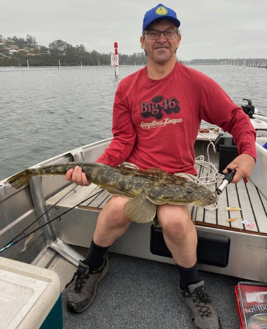 Impressive: Stuart Green of South Pambula with his 92.7cm dusky flathead caught and released in Merimbula Lake. It shows that Mogareeka is not the only place inhabited by these giants.
