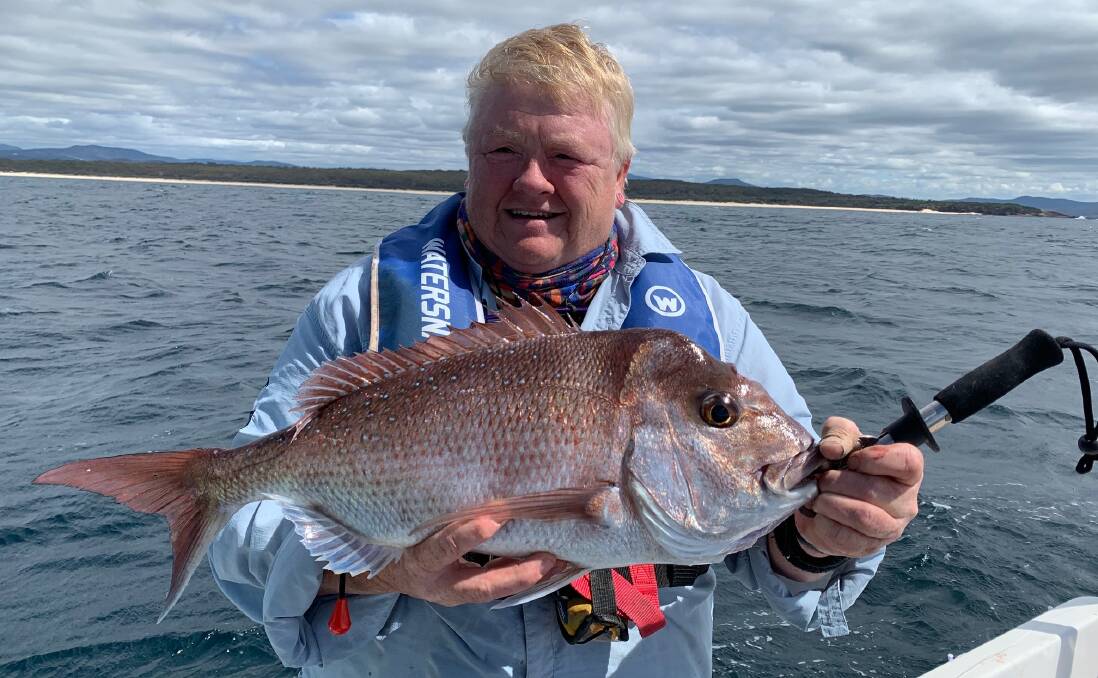 Good fish: Heather Sutterby of Tura Beach shows a snapper weighing in over two kilos taken south of Haycock Point. 