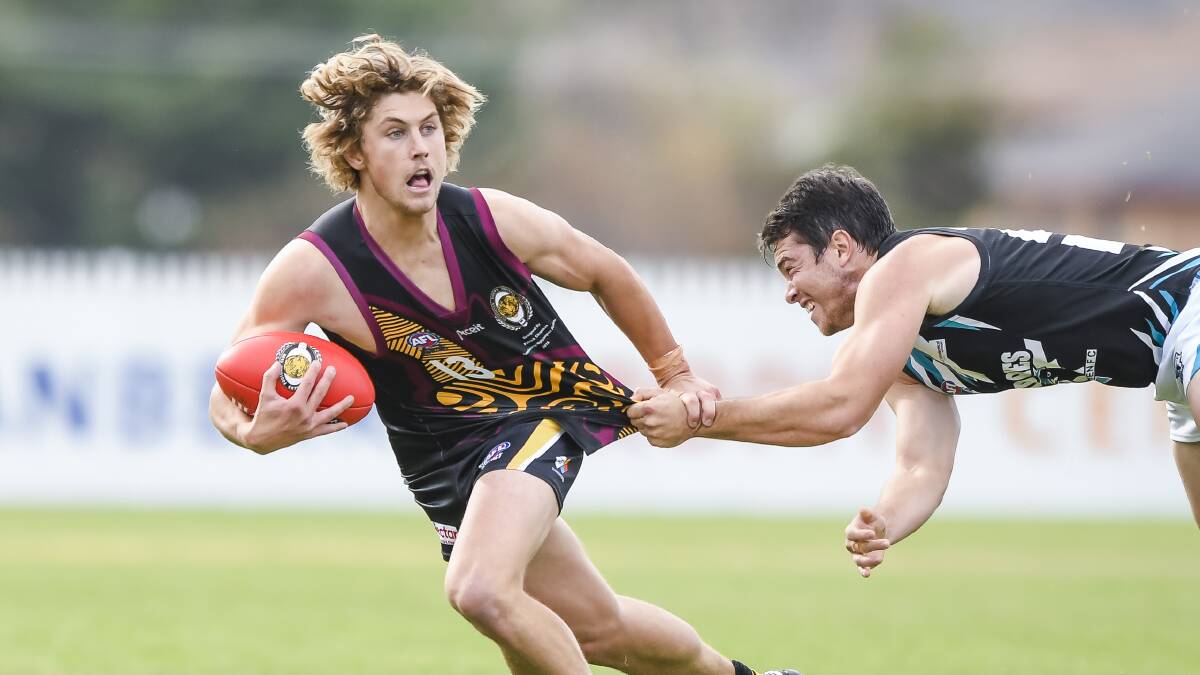 Top of pops: Former Tathra footballer Kel Evans has been named Canbera's best and fairest recently. Photo: Sitthixay Ditthavong  