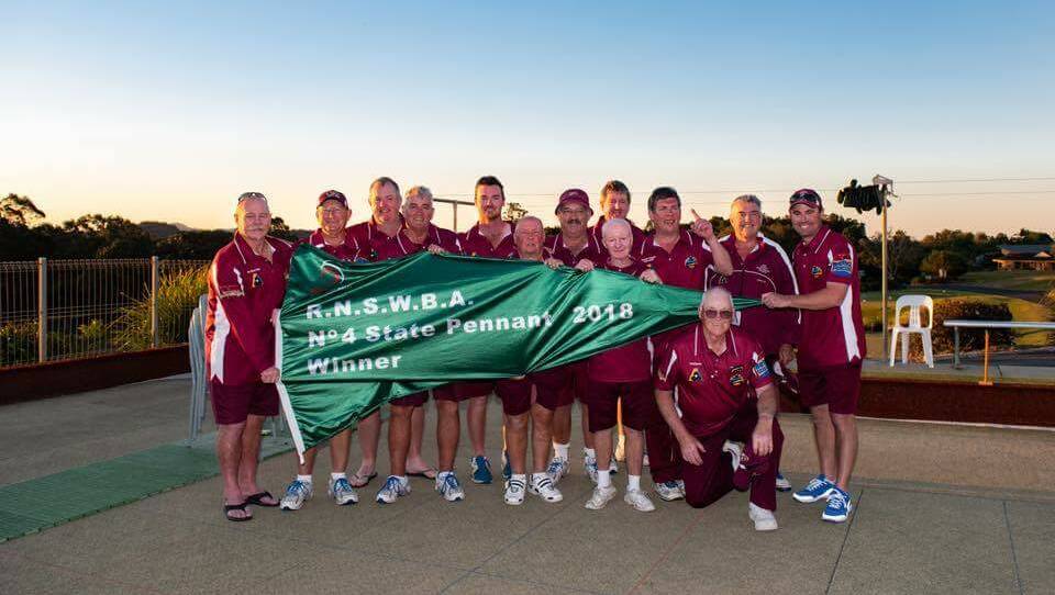 Flag winners: Tathra's Pennant four state flag winning team celebrate after the presentation recently. 