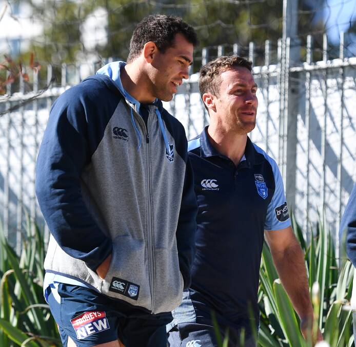 Dale Finucane pictured with James Malone in camp is supporting the Blues' push for people to donate gifts for bushfire victims. 
