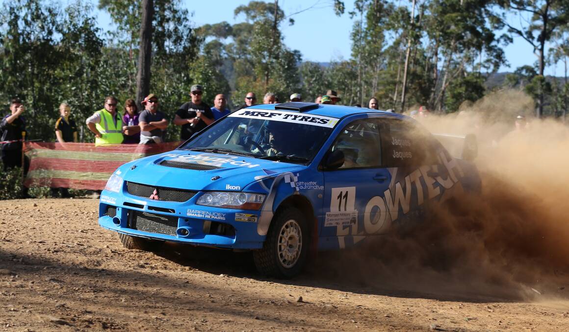 Bega Valley Rally drivers wow fans with a high-speed corner on a forest road stage last year with this year's event dates cancelled. 