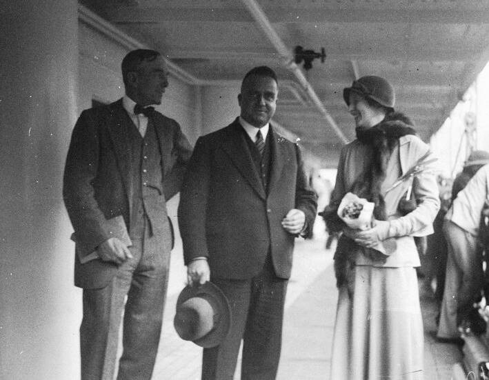 Governor Sir Philip (left) and Lady Game (right) being farewlled by Premier Bertram Stevens, upon their departure from Sydney in 1935. Photo: Sam Hood. 