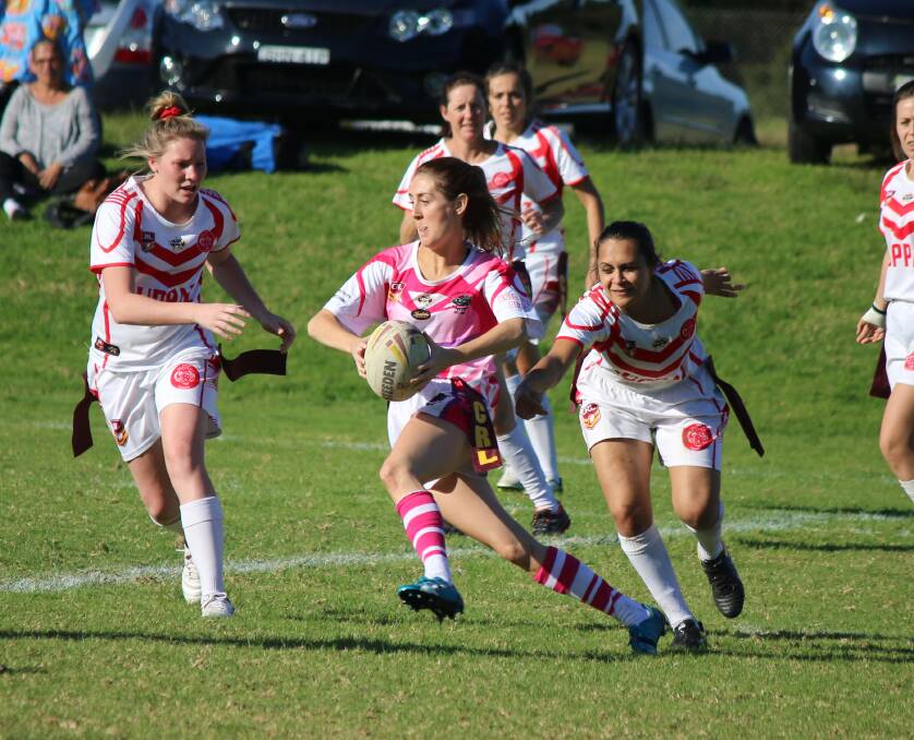 A Pink Panther darts past some Eden Tigers girls during a match last year with the Panthers going down to a revitalised Bay outfit on Sunday. 