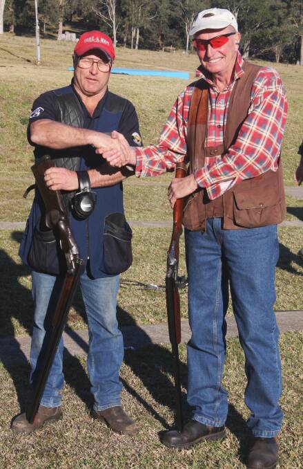 Top scorers: George Toyne (right) congratulates High Gun winner Phil Body after the pair faced a shoot off for the honour. 